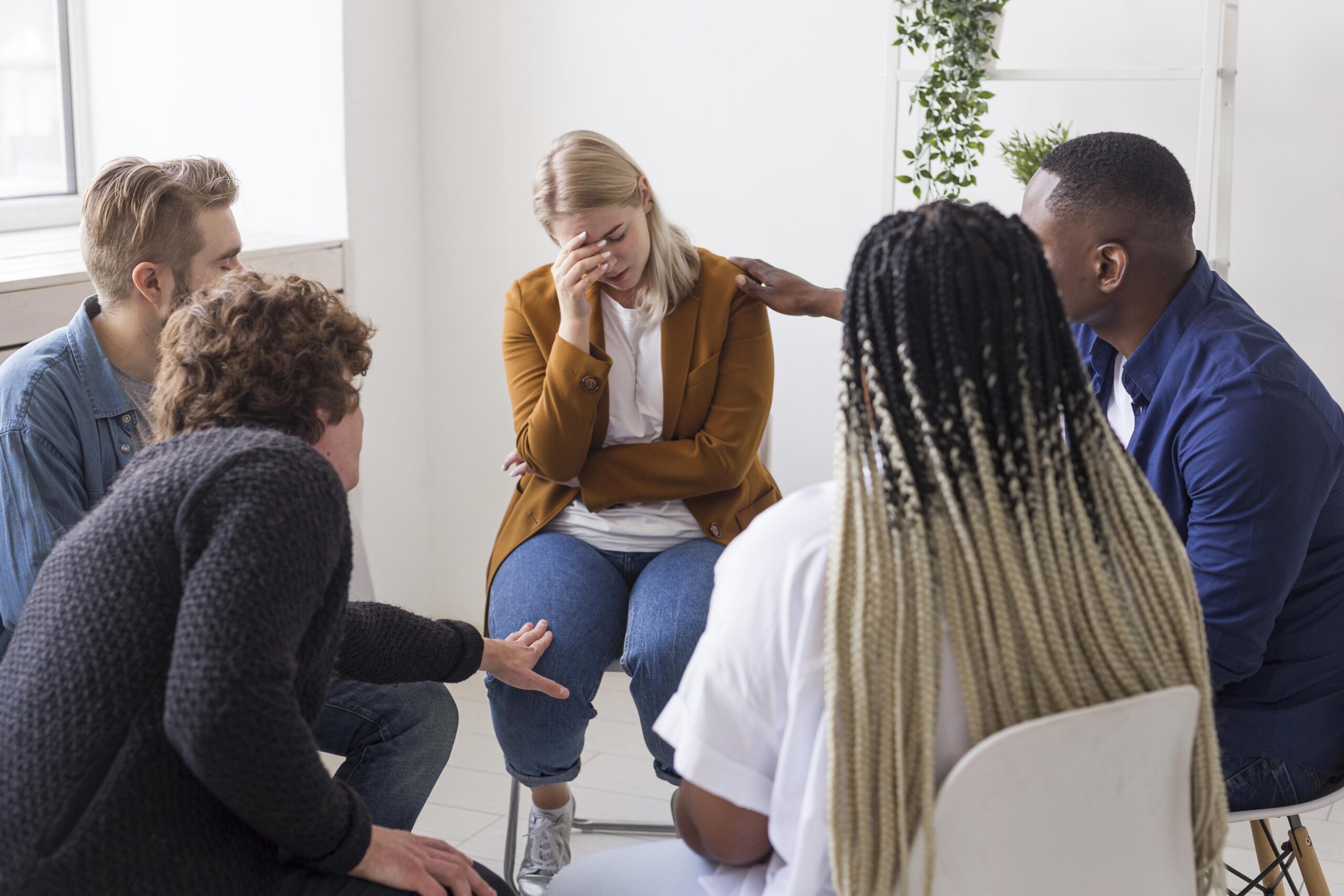 Adults participating in trauma-focused group therapy as part of a PTSD treatment program in Ohio