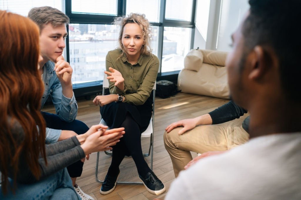 Group therapy discussion at a sober living house in Columbus Ohio