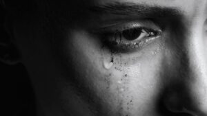 types of depression hero image of a woman crying.